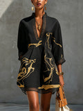 Brigitte | Mini czarna sukienka z złotym marmurowym nadrukiem i koronką